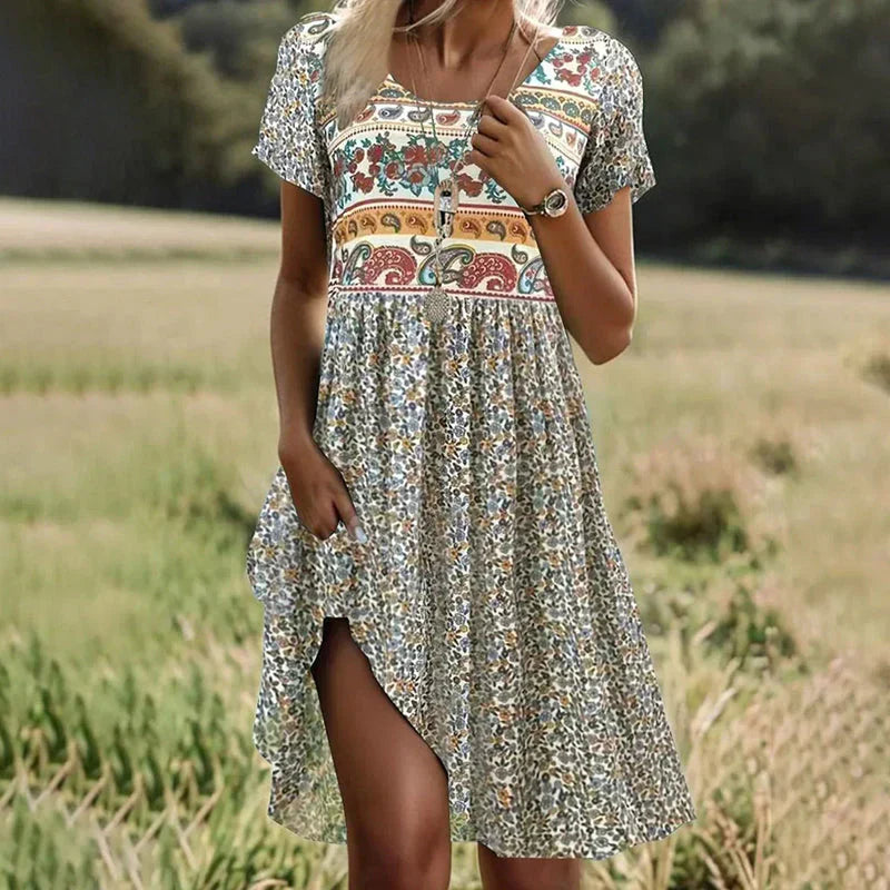 Lise | Vestido midi de manga corta y cuello redondo de lunares