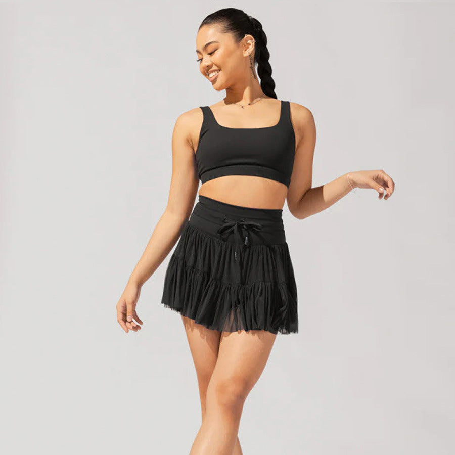 Minifalda mujer cintura alta con pliegues y short integrado