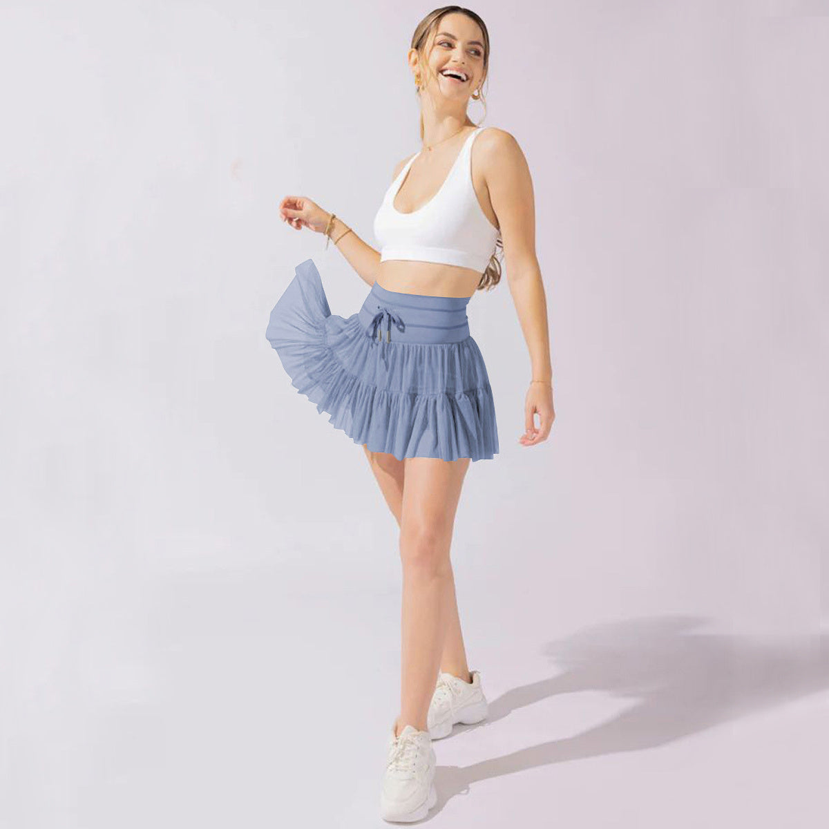 Minifalda mujer cintura alta con pliegues y short integrado