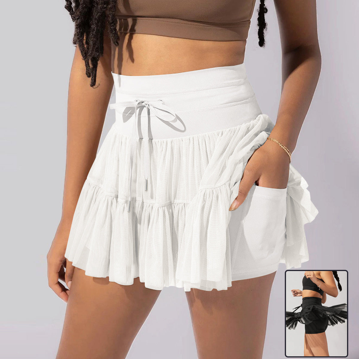 Minifalda mujer cintura alta con pliegues y short integrado