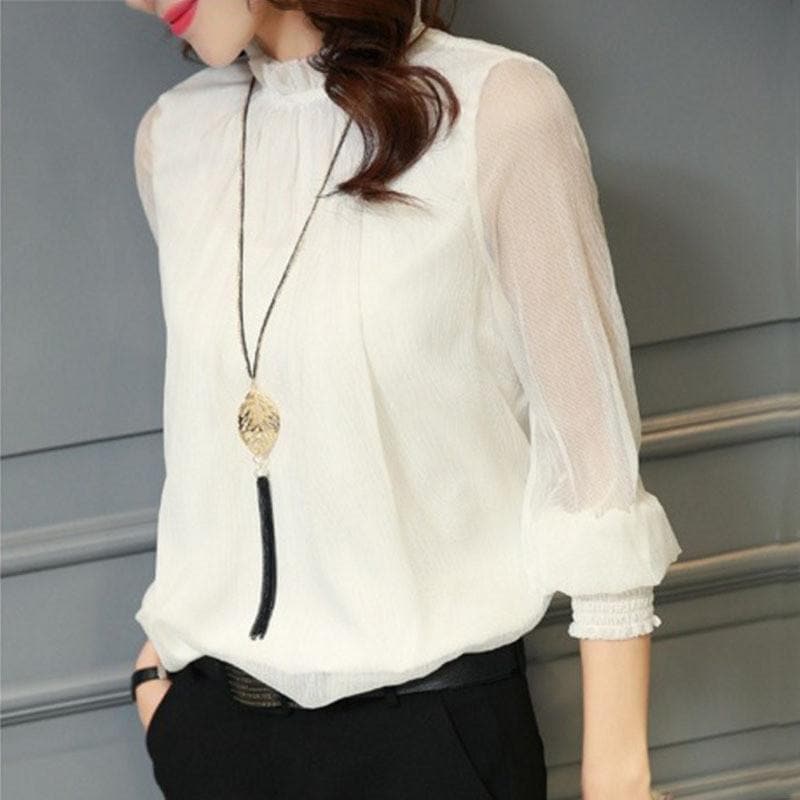 Camisa con volantes y mangas transparentes