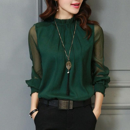 Camisa con volantes y mangas transparentes